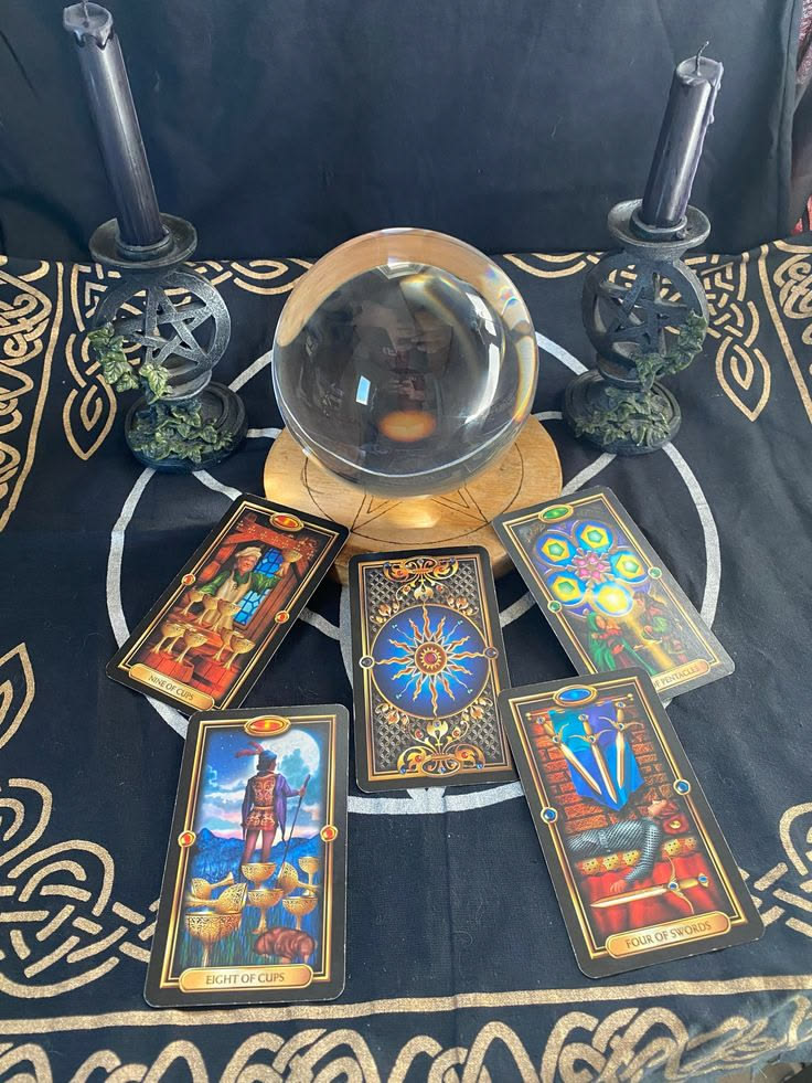 Candles and ritual objects laid out for a psychic reading